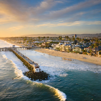  Vista of Newport Beach California overlooiking the pier, beach, and city during daytime
